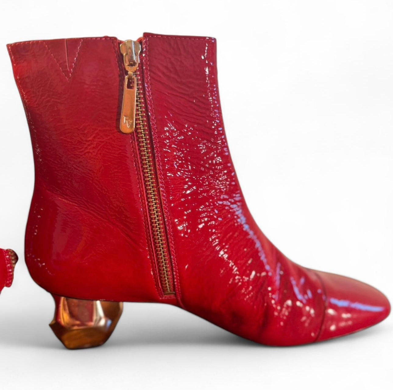 Frances Valentine | 
Marnie Soft Patent Crinkle Boot In Cranberry | 8 1/2 B

$225

This crinkled patent leather mid-heel bootie features patented signature heel inspired by Buckminster Fuller's omni-triangulated geodesic dome.
 
1.25'' heel: stretch nappa